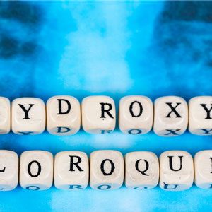 A close up of the word hydroxyz on some dice