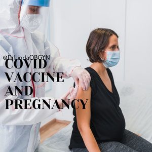 A woman getting her covid vaccine from a doctor.
